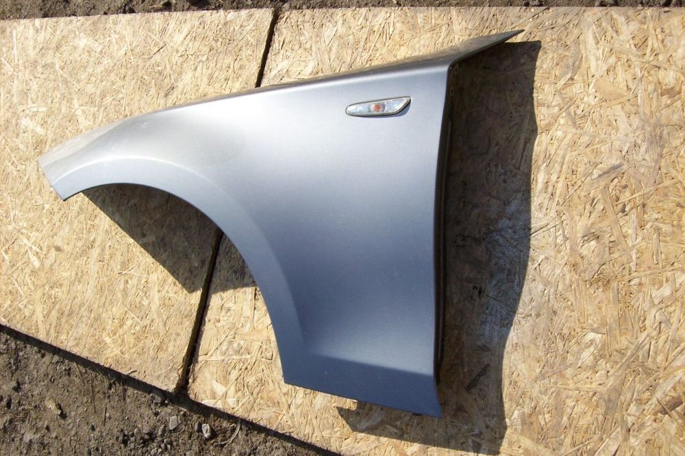 BŁOTNIK LEWY BMW I E-87