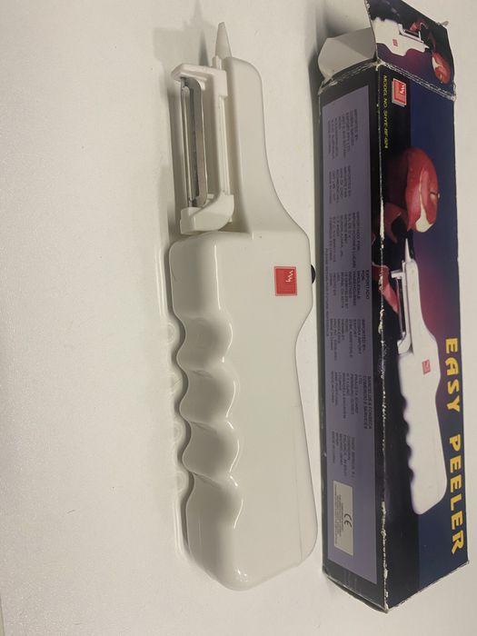 Nearly New Electric Fruit or Vegetable Peeler64575238492801122