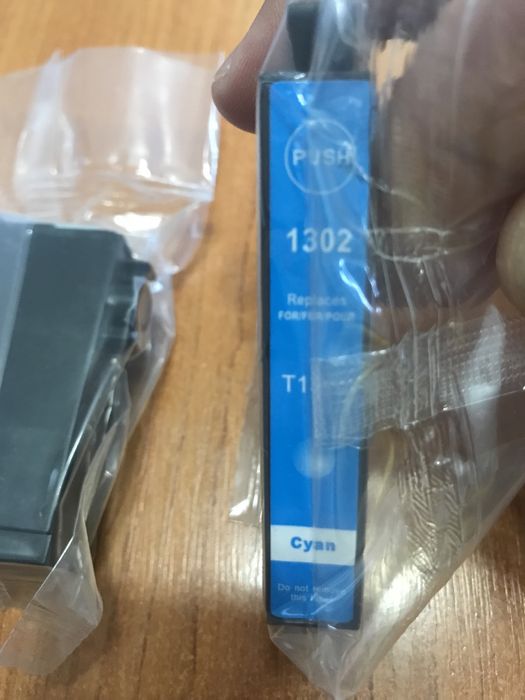 Голубой картридж  Epson T1302