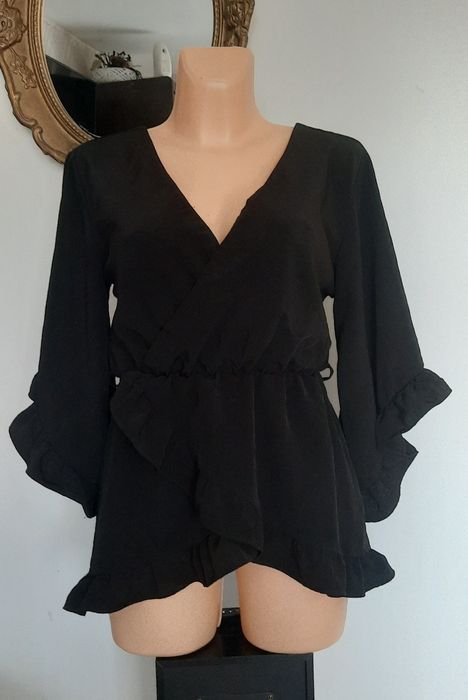 Śliczna bluzka z falbanką-River Island