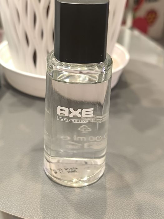 Płyny po goleniu Axe i skino