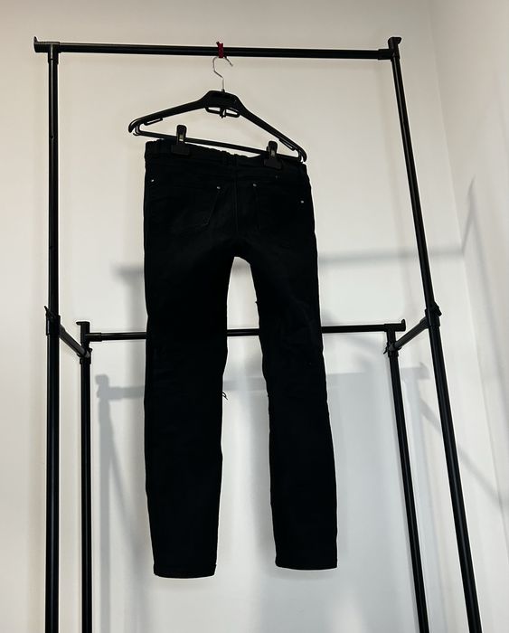 Calças de ganga rasgadas