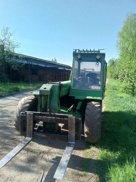 Вилочний телескопічний навантажувач