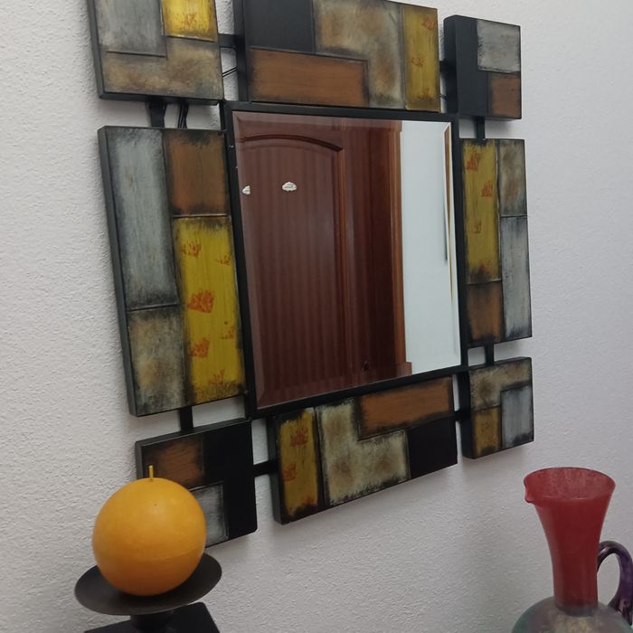 Espelho e castiçal