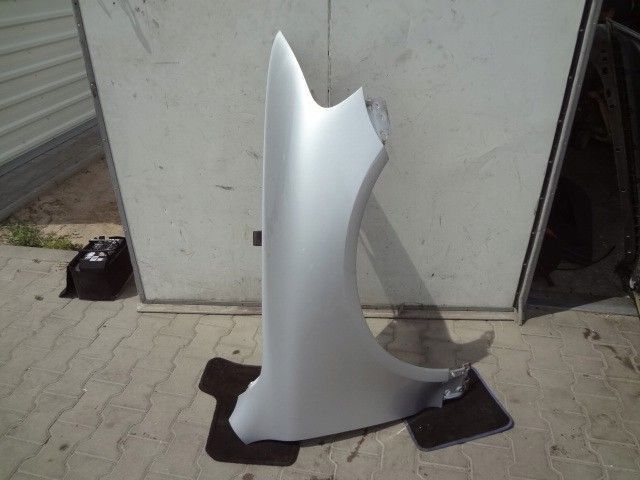 VW TOUAREG 7L 02-10r BŁOTNIK PRAWY PRZÓD LA7W