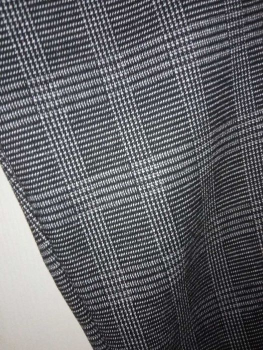 Штани теплі в клітинку