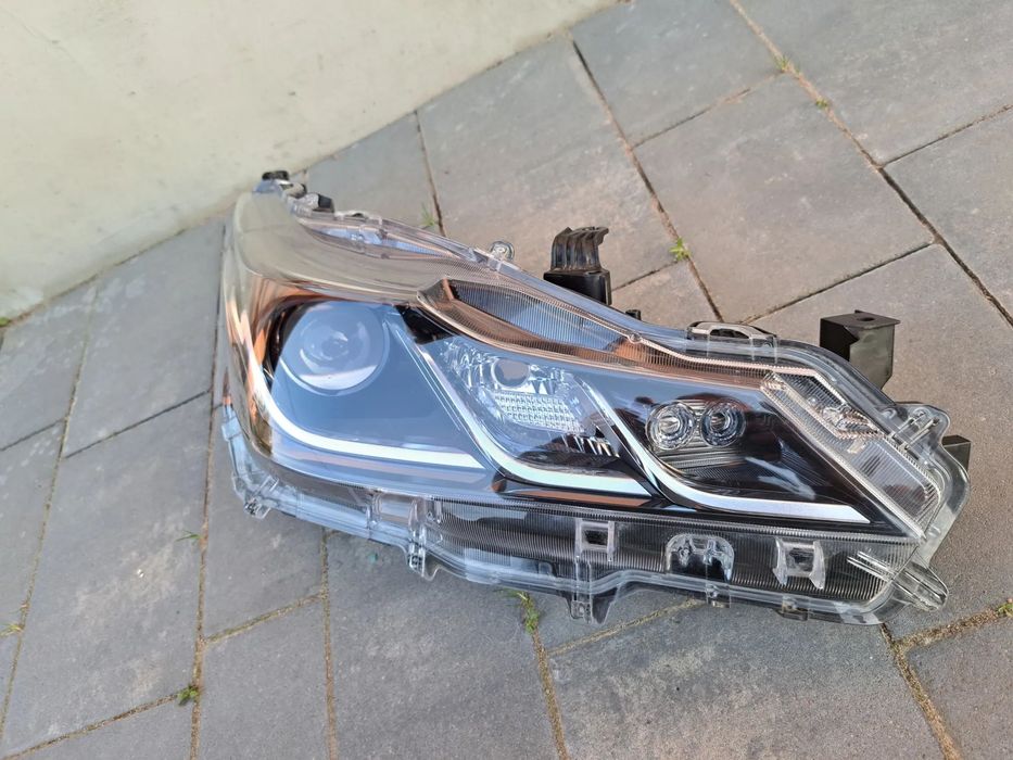 Reflektor prawy Toyota Corolla E21 ,