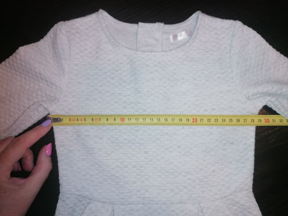 Sukienka z kieszeniami r. 104