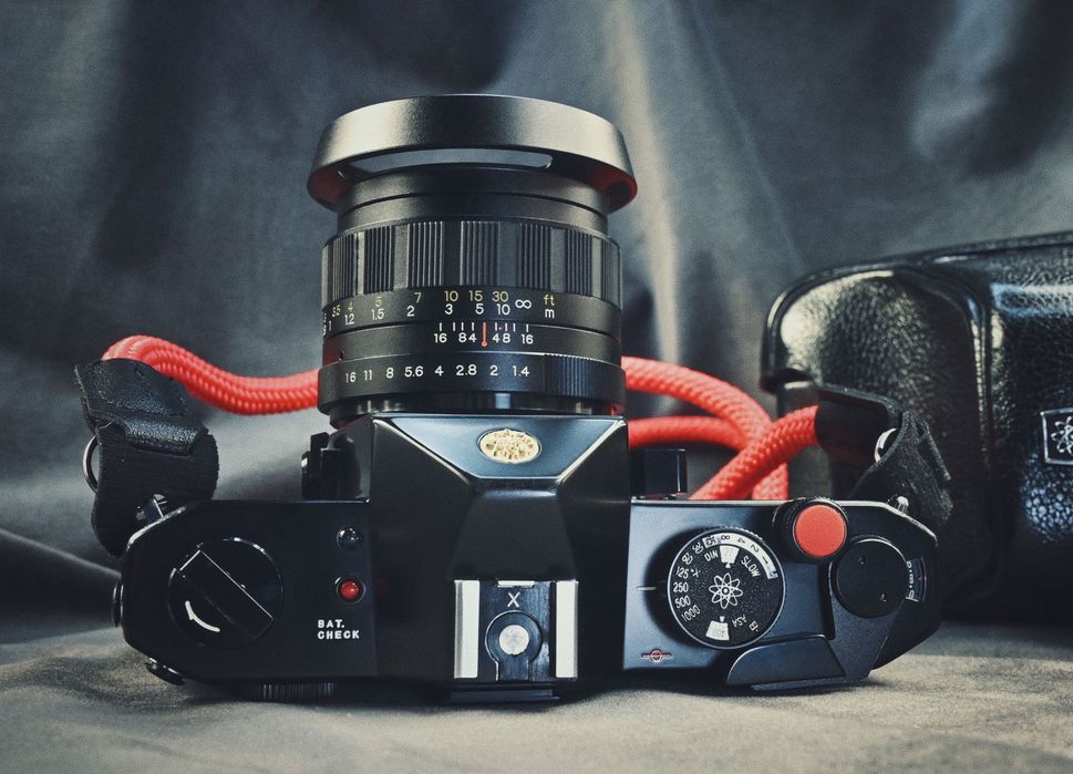 Legendarna YASHICA TL Electro X ITS 1.4/50mm + osłona, przycisk, pasek