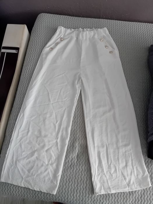 Spodnie biale szerokie