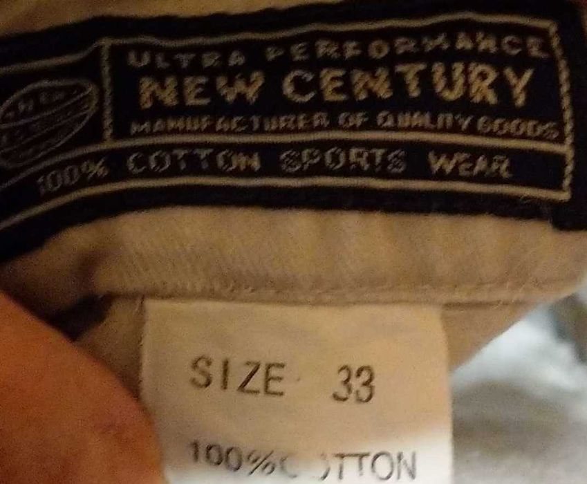 Białe jasne szare spodenki krótkie bojówki Nike New Century 40 L r33