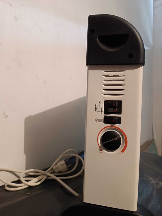 Aquecedor eléctrico em excelente estado.