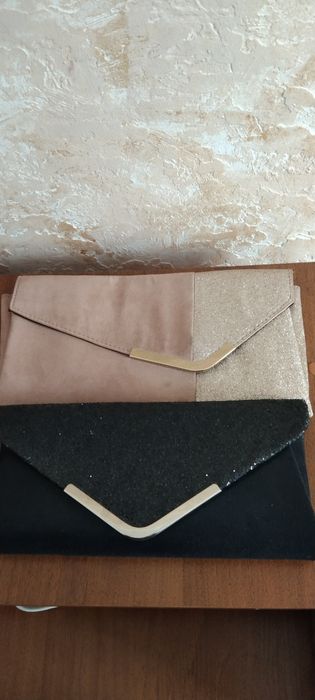 Клатчі майже нові