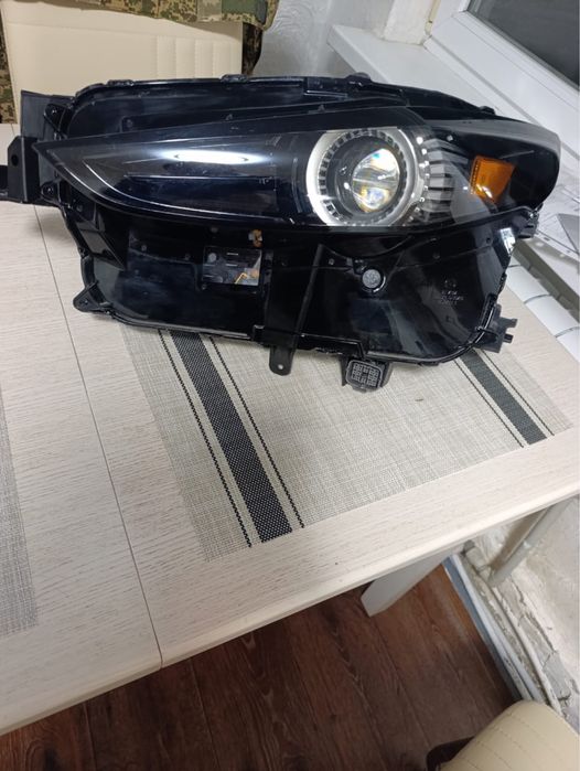 Фара ліва мазда сх-30