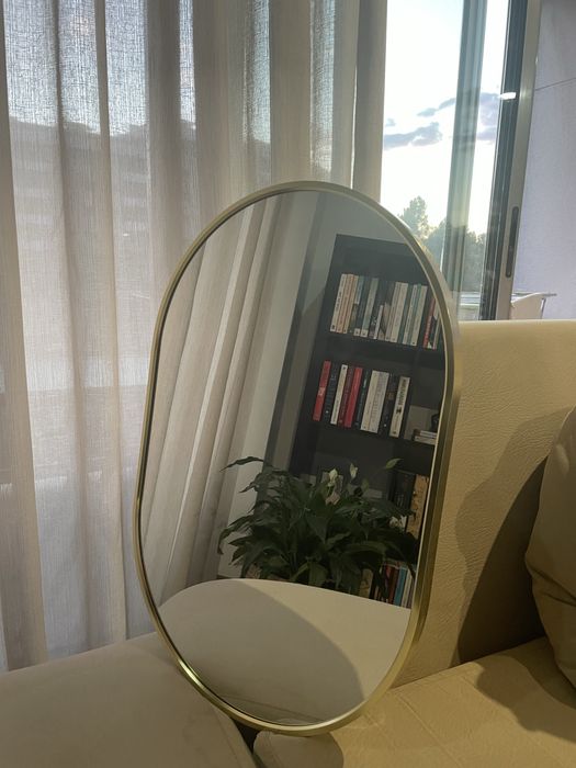 Espelho dourado redondo