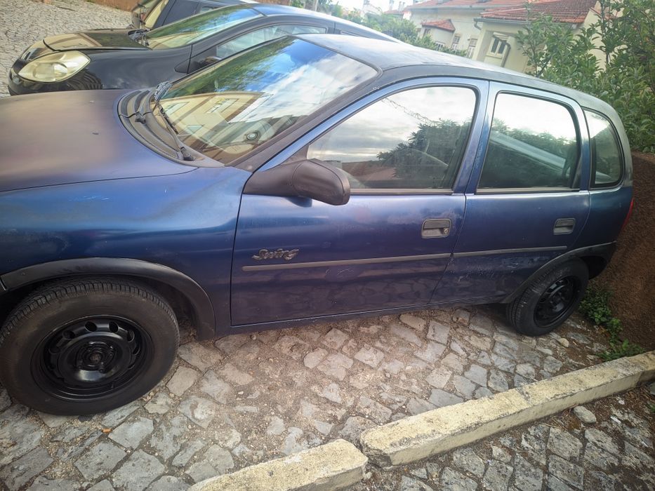 Carro Opel Corsa 700€  com poucas marcas do  tempo, carro muito fiável — photo 4