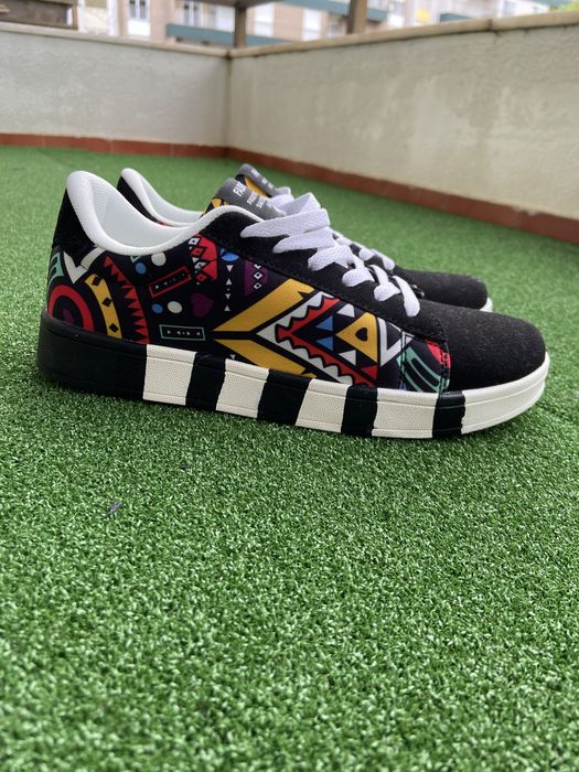 Tenis muito novo usei 1 x N 42