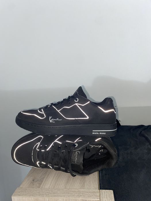 Tênis Carl Kani em bom estado