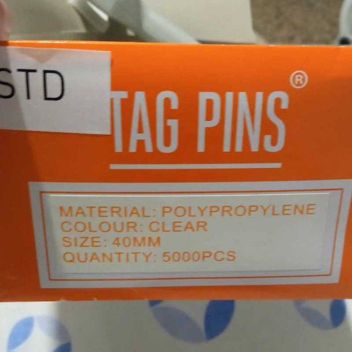 Pistola com tags e agulhas