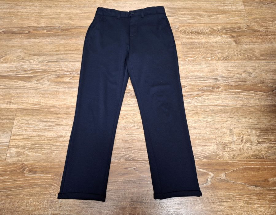 Spodnie materialowe Reserved. Roz 146