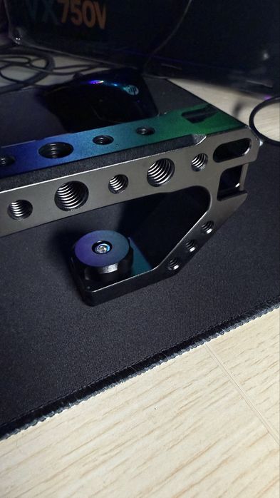 Pega superior (top handle) para câmara