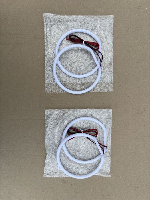 BMW E39 Ringi Cotton POLIFT Hella zestaw Plug and Play Mocne Białe
