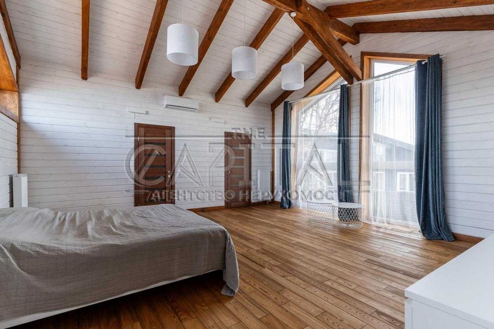 Сучасний енергоефективний будинок преміум-класу серед природи Лісники