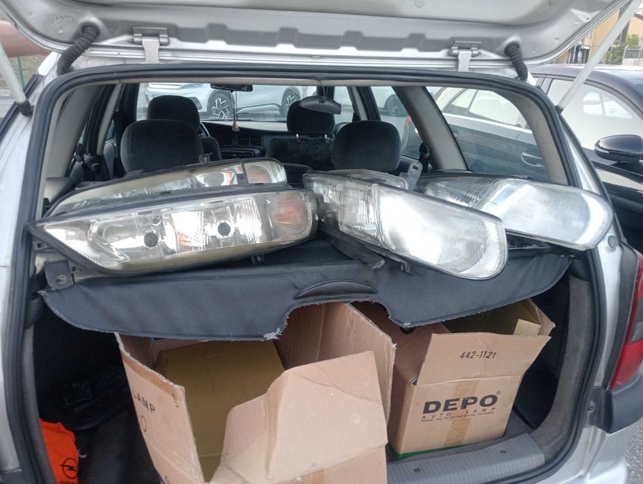 Óticas carrinha opel vetra