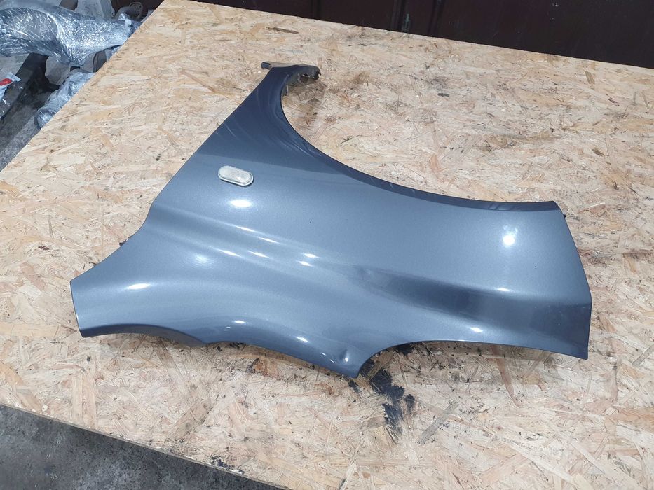 Błotnik lewy Nissan Micra K12 04r lakier KY5G bez rdzy