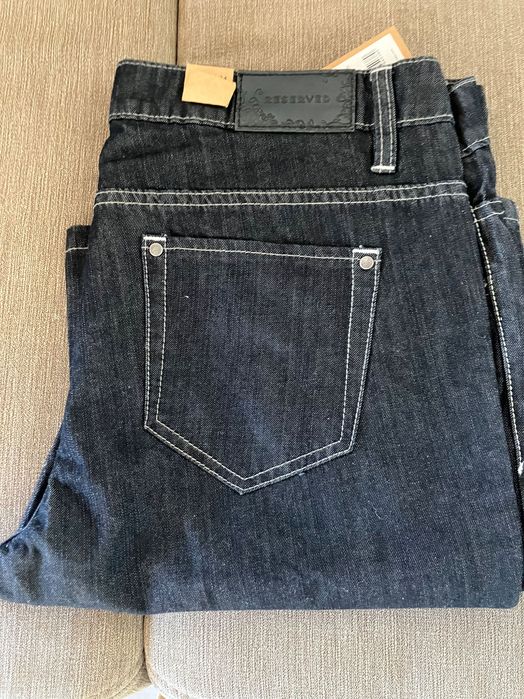 Spodnie dzwony Reserved