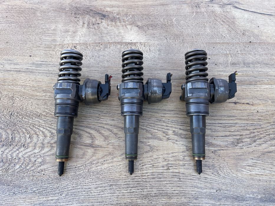 Насос форсунка 1.9 tdi bls VW Passat B6 VW Golf 5 VW Caddy 038130073BN