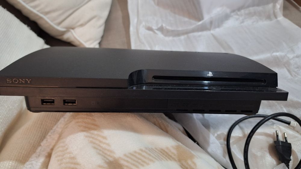 Consola PS3 e comandos