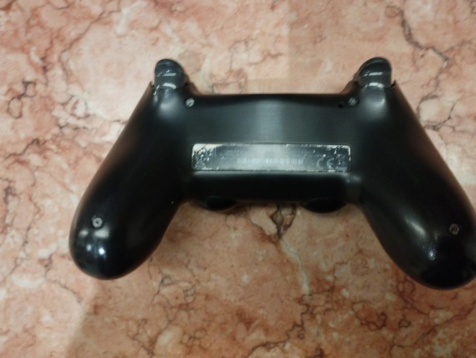 Comando original para PS4 com avaria do drift no analógico