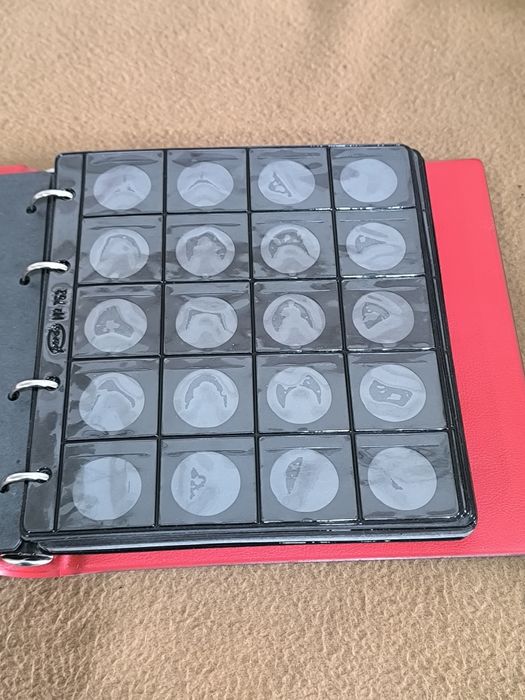 Álbum p/ coleção de moedas