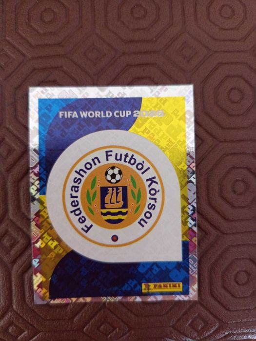 Figurinha Doku Bronze 2026 e outras figurinhas