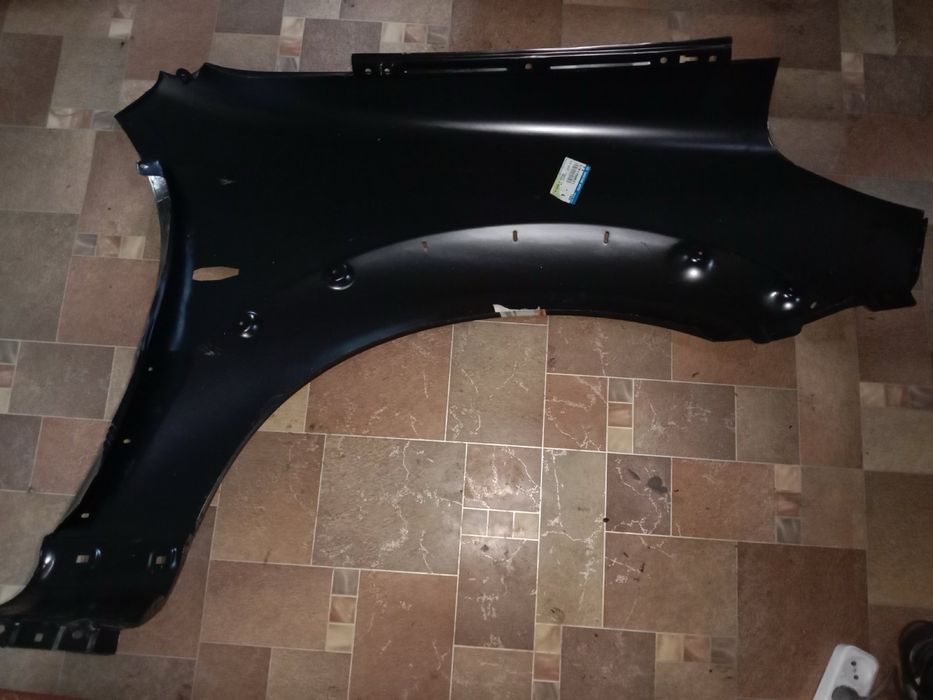 Продам крило на Ssang Yong Rexton