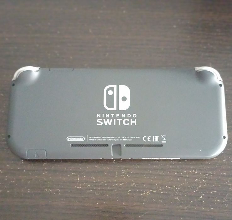 Nitendo Switch Lite com mala e proteção de vidro COMO NOVA!64284526000770122