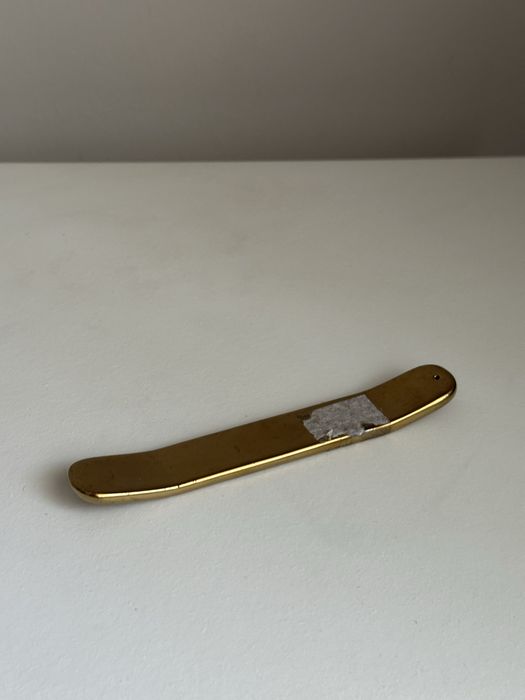 Porta incenso dourado