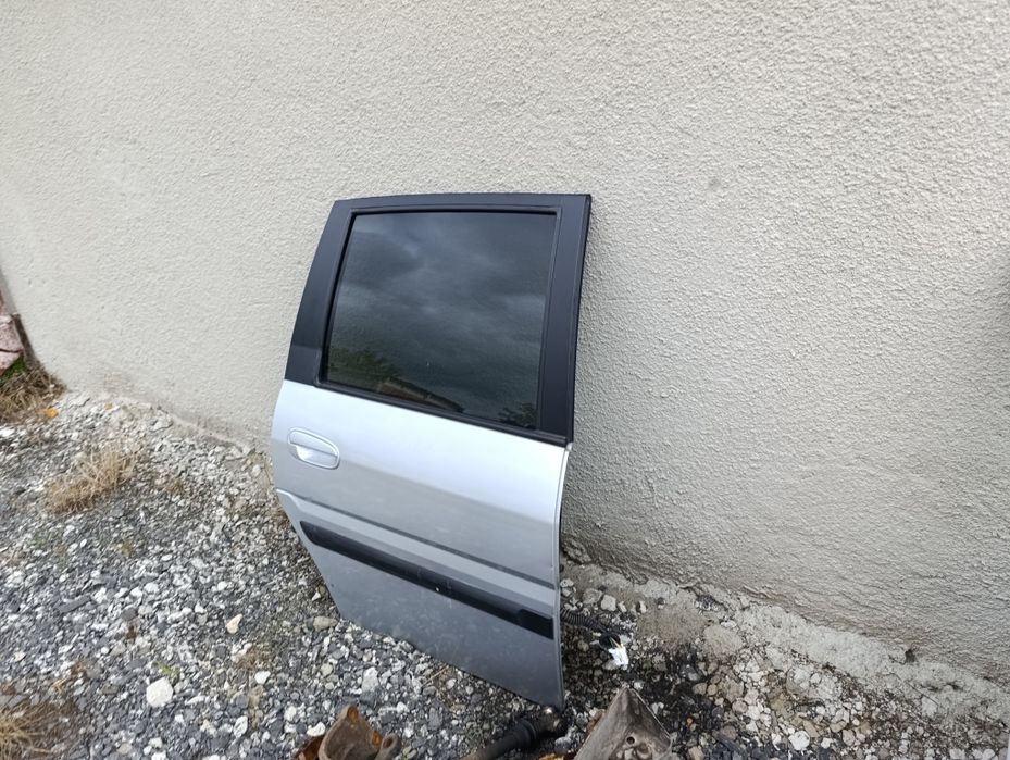 Drzwi lewe prawe przód Hyundai Matrix 2008