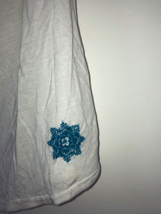 Biała bluzeczka na ramiączkach idealna na wakacje  House