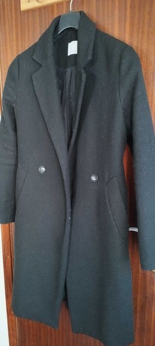 Casaco comprido preto bom estado.