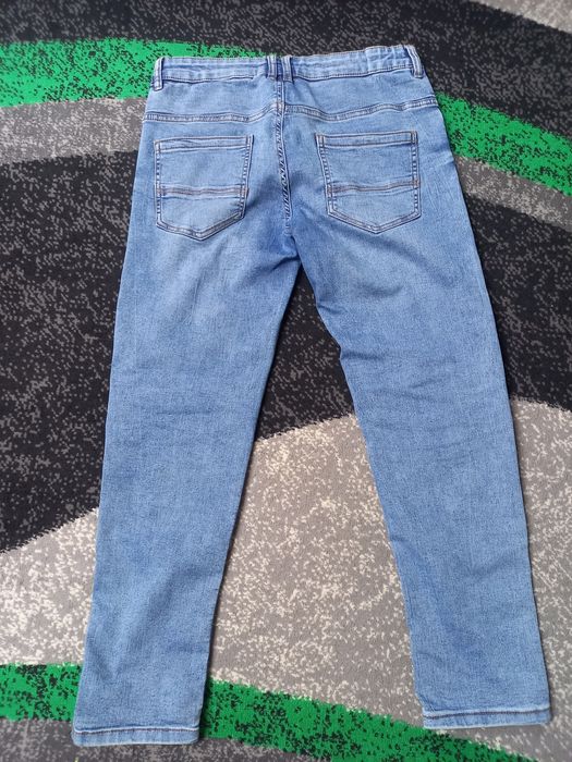 Spodnie jeans  Reserved r. 158
