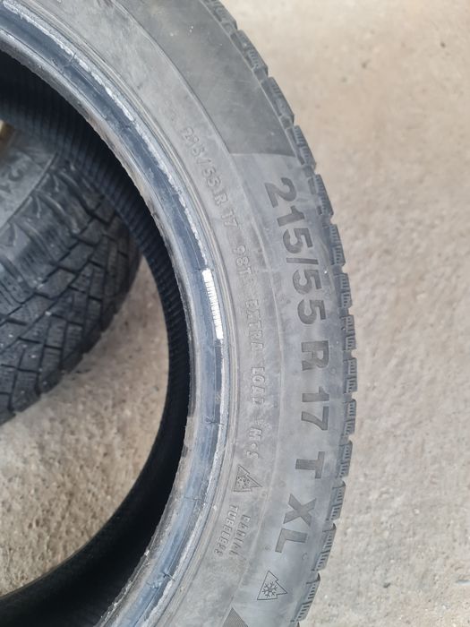 Opony zimowe para 215/55/17 continental .
