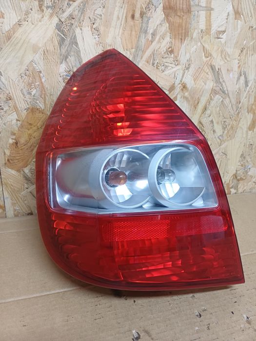 Задній лівий  ліхтарстоп фонарь Honda Jazz Хонда джаз Лівий