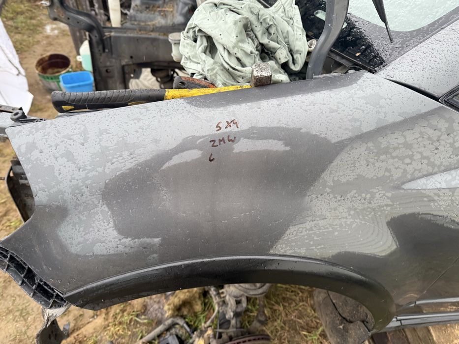 Suzuki sx4 zmw blotnik lewy prawy