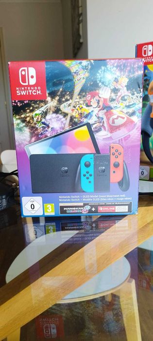 Nintendo Switch Oled + Ring Fit Adventure