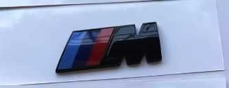 Nowy emblemat znaczek Mpower 55x22mm czarny połysk czarne błyszczące