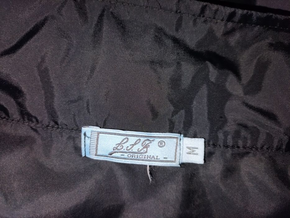 Casaco corta vento/ chuva