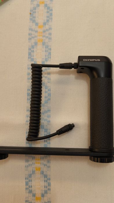 Uchwyt lampy błyskowej Olympus FL-BK01