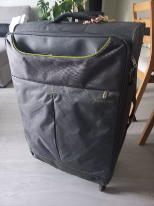 Mala de viagem 23 kg - Sansonite  em tecido com cinza.